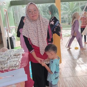 Pembagian PMT (Pemberian Makanan Tambahan) untuk Balita di Pekon Mulyorejo Kecamatan Banyumas berlangsung lancar